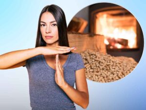 donna che dice stop, sullo sfondo pellet