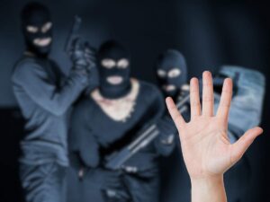 ladri sullo sfondo mano che indica un alt